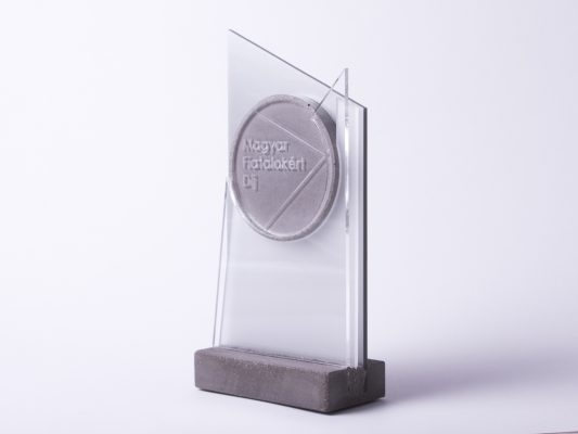Unique custom made trophy design made of concrete and acrylic glass