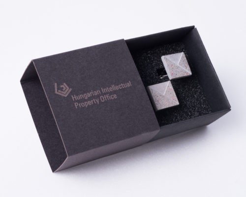 Concrete cufflinks as diplomatic gift
